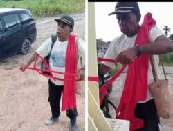 Kepala Suku Moi Maya Palang Kantor GAKUM Sorong Dengan Kain Merah